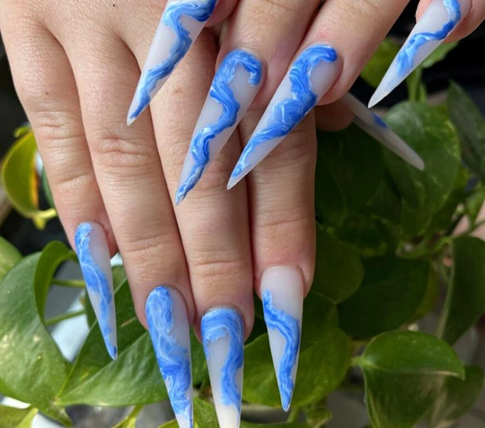 Acrylic nail design blue splash